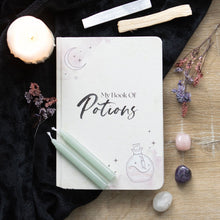 Load image into Gallery viewer, My Book Of Potions A5 Notebook. Keep track of spells, rituals and recipes in this A5 Book of Potions notebook with lined pages. Features a mystical potion bottle and pink watercolour design on the cover that&#39;s perfect for any modern witch. 