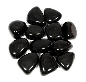 Black Onyx Tumblestone.  Black onyx brings the deepest and truest reflection of your soul. It filters the shallow perception from the people that surrounds you and it lets them see the depths of your personality.